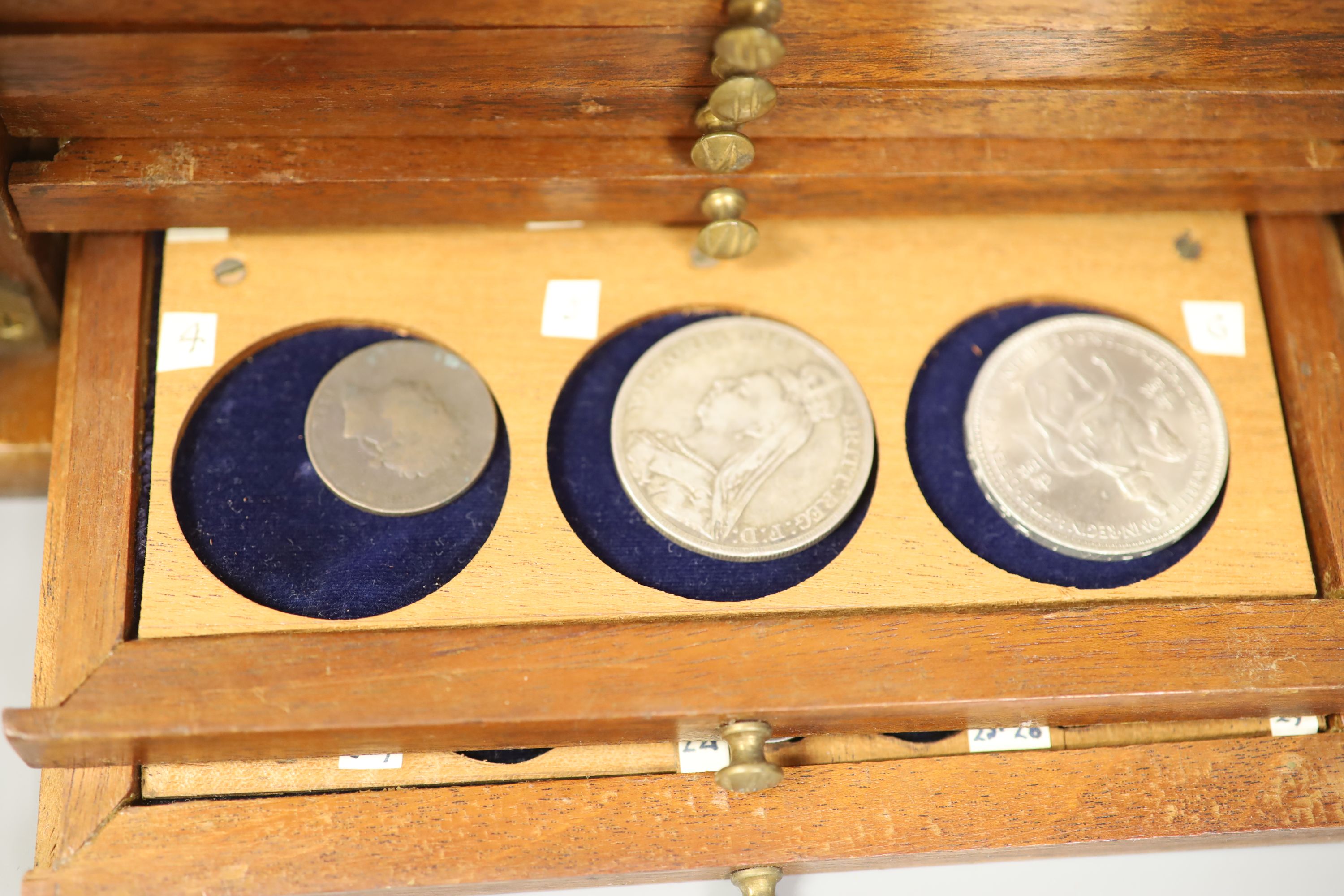 A quantity of mixed coins (in cabinet)